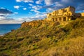 Ghajn Tuffeha, Malta - Golden hour at Ghajn Tuffieha beach on a lovely summer day with beautiful sky Royalty Free Stock Photo