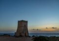 Ghajn Tuffieha Tower in Golden Bay at sunset - Malta Royalty Free Stock Photo