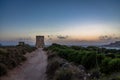 Ghajn Tuffieha Tower in Golden Bay at sunset - Malta Royalty Free Stock Photo