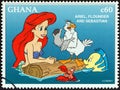 GHANA - CIRCA 1996: A stamp printed in Ghana shows Ariel, Flounder and Sebastian, circa 1996.