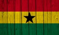 Ghana Flag Over Wood Planks