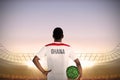 Ghana football player holding ball Royalty Free Stock Photo