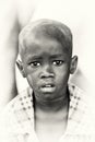 A Ghanaian boy with asking eyes