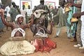 Ghanaian men dancing ritual dance to please gods Royalty Free Stock Photo