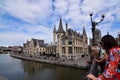 Ghent, Belgium, August 2019. Breathtaking cityscape: from the St. Michael`s bridge to the street along the Graslei canal. One of