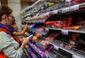 Ghent, Belgium, August 2019. Whole exhibitors dedicated to the Belgian specialty: chocolate at a supermarket. The packaging