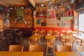 Empty restaurant in mexican style with tables and antique decoration