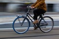 Ghent, Belgium; 10/31/2018: Panning effect photography of a bike through a street in the city