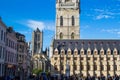 Ghent, Belgium; 10/26/2019: Sint-Baafsplein with the facade of the Belfry of Ghent Het Belfort and Saint Nicholas` Church Sint Royalty Free Stock Photo