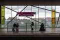 Ghent, Flemish Region - Belgium - Travellers waiting at the platform of the Ghent Saint Pieter railway station