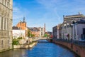 Ghent Reep, a small canal with a bridge and houses in both sides. Wall of Castle of Gerald the Devil on the left Royalty Free Stock Photo