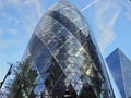 London, England: 13 May 2019: Gherkin building Modern office blocks City of London