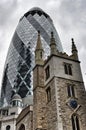 The Gherkin and church. City of London