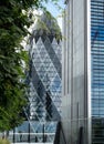 Gherkin Swiss Re Building, 30 St Mary Axe in the City of London financial district, UK. Photographed from Fen Court Garden.