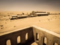 Ghost buildings of old diamond mining town Kolmanskop in Namibia Royalty Free Stock Photo