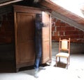 Ghost comes out of a wooden closet Royalty Free Stock Photo