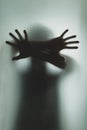 Ghost concept shadow of a men behind the matte glass blurry hand Royalty Free Stock Photo