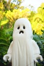 Ghost figure for halloween and palm tree