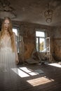 Ghost of a girl in a room of an old abandoned house Royalty Free Stock Photo