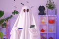 ghost of Halloween uses mobile phone to surf the Internet, to browse online stores, markets. ghost makes order from