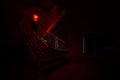 Ghost in Haunted House at stairs, Mysterious silhouette of ghost man with light at stairs, Horror scene of scary ghost spooky llig Royalty Free Stock Photo