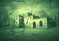 Ghost House behind tree branches Royalty Free Stock Photo