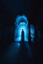 Ghost at night in castle in blue light. AI generative. Halloween