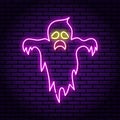 Ghost purple neon sign. Against the background of a brick wall. Halloween. Emotions of fear and horror