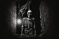 ghost skeleton, hanging from noose by its own neck, in dark and mysterious scene