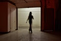 Ghostly Black female Silhouette haunting warehouse
