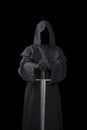 Ghostly figure with sword isolated on black Royalty Free Stock Photo