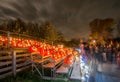 Ghostly people looking at pumpkins