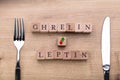 Ghrelin And Leptin Words On Wooden Desk