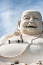 AN GIANG, VIET NAM- OCT 16: Workers fix white big buddha statue in Nui Cam nature reserve, Angiang, Vietnam, Oct 16, 2015