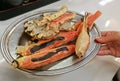 Giant Alaska King Snow crab legs grilled on silver plate Royalty Free Stock Photo