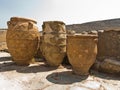 Giant amphoras and pottery for food and wine from 3500 years ago at the palace of Knossos, near Heraklion harbor, island of Crete Royalty Free Stock Photo