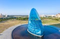 A giant blue glass wedding church shaped like a high-heeled shoe in Taiwan Chiayi, aerial view. Time-lapse photography.