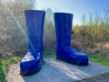 Giant blue wellington boots sculpture at The Land of the Giants, Clare Lake, Claremorris