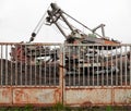 Giant bucket wheel excavator behind an iron gate Royalty Free Stock Photo