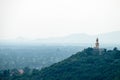 Giant Budda image on hill, face to Petchaburi town