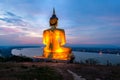 A giant Buddha image statue looking to Mekong river