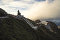 Giant buddha statue on the top of Fansipan mountain peak, Backdrop Beautiful view blue sky and cloud in Sapa, Vietnam. Buddha Royalty Free Stock Photo