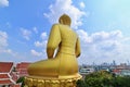 Giant Buddha of Wat Paknam Phasi Charoen and Bangkok\'s Skyline