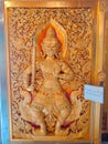 Giant carved wooden door in Thai temple