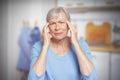 elderly woman headache migraine hypertension Royalty Free Stock Photo