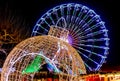 Giant Christmas ball and Ferris wheel. Christmas fair in Maastricht, Netherlands. New Year decorations at Christmas market. Ferris Royalty Free Stock Photo
