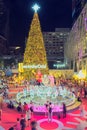 Giant Christmas tree and Christmas theme decoration and blurred people moving at Central World on night scene