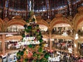 Giant Christmas tree decoration inside Galeries Lafayette Parisian department store