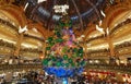 The giant Christmas tree inside Galeries Lafayette Parisian department store,Paris, France.