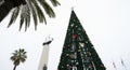 Giant Christmas Tree and Monument with Ship in a Tropical Setting Royalty Free Stock Photo